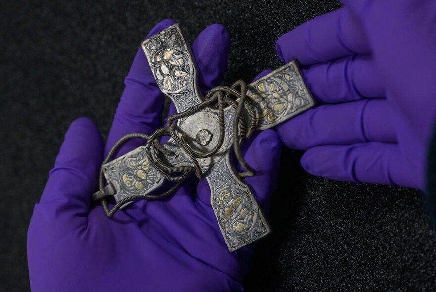 An ornate metal cross from the Viking discovery, the Galloway Hoard.