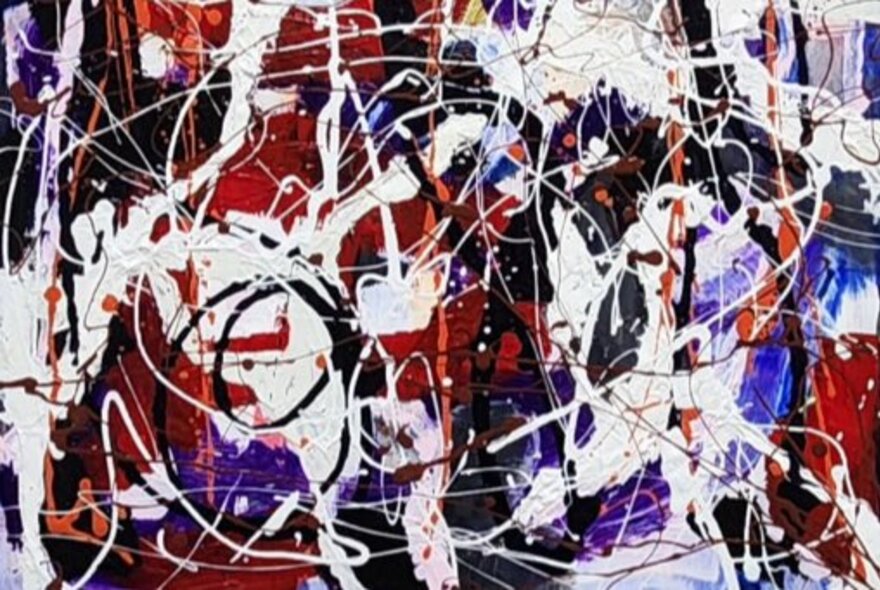 Abstract painting of white and black splatter and drip paint marks over a red and blue background.