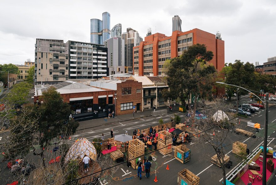 Carlton street closed off to traffic with people and event props.