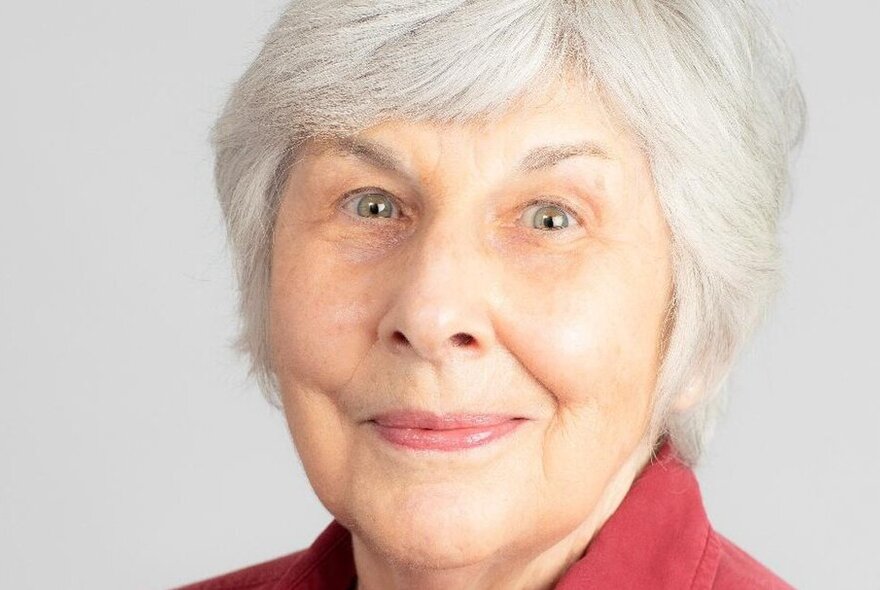 Author Sheila Fitzpatrick, smiling with short grey hair.