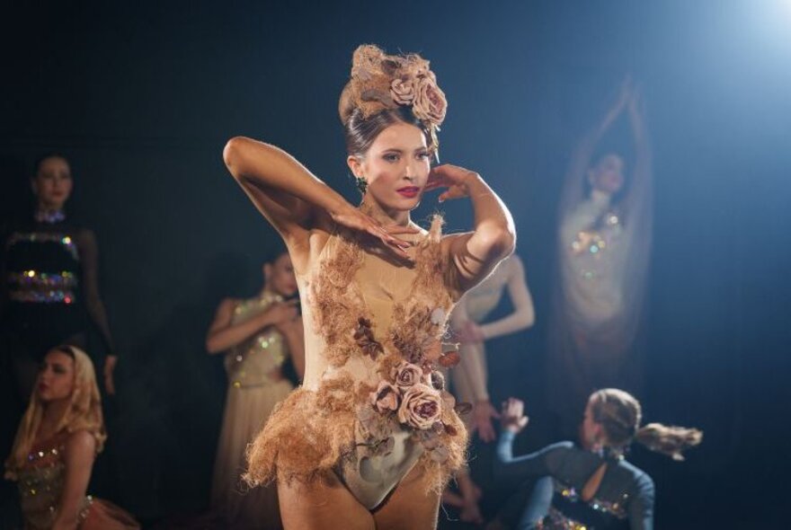 Dancer performing wearing a floral tutu.