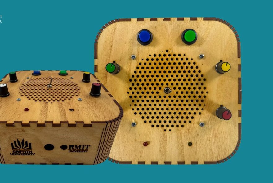 A wooden LoFi sequencer, with coloured dials, against a blue background.