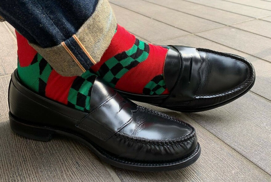 Pair of brightly-coloured, patterned socks.