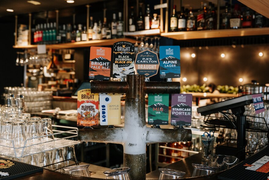 The bar of the Prince Alfred Hotel with bottles, glasses and beers on tap. 