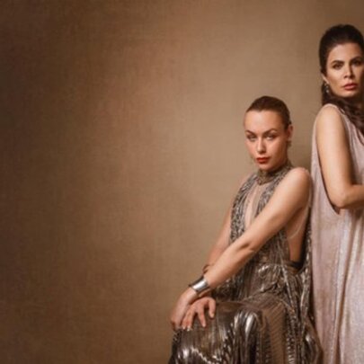 Models against beige/brown background wearing brown-hued formal gowns.