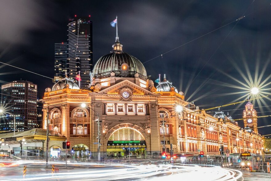 A historic station at night