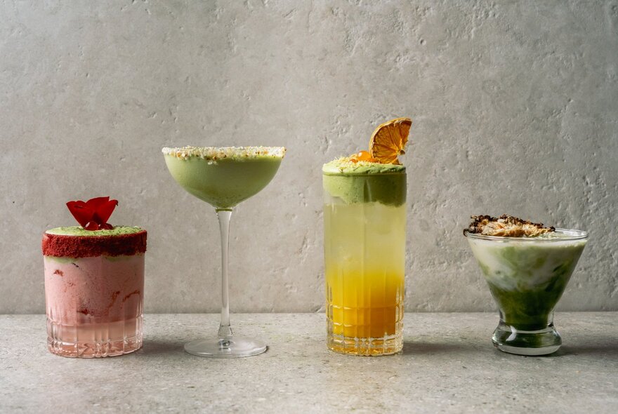 Four individual matcha-themed drinks. 