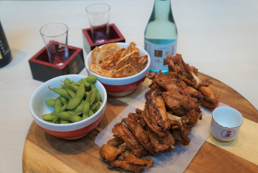 Fried chicken and edame beans.