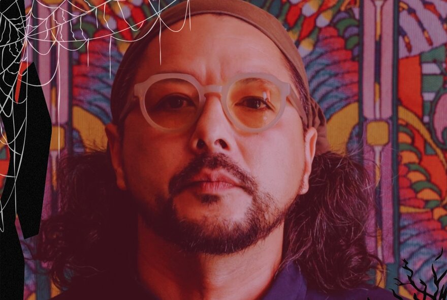 Jerry Poon (also known as JPS), a prominent Melbourne DJ, wearing glasses and a cap, posed against a colourful background.