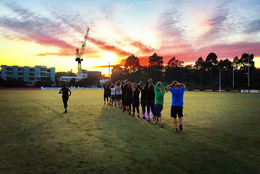 People exercising in a park.