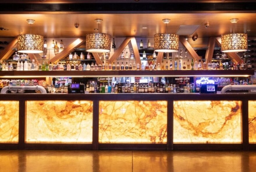 View of an empty bar with a warm glow. 