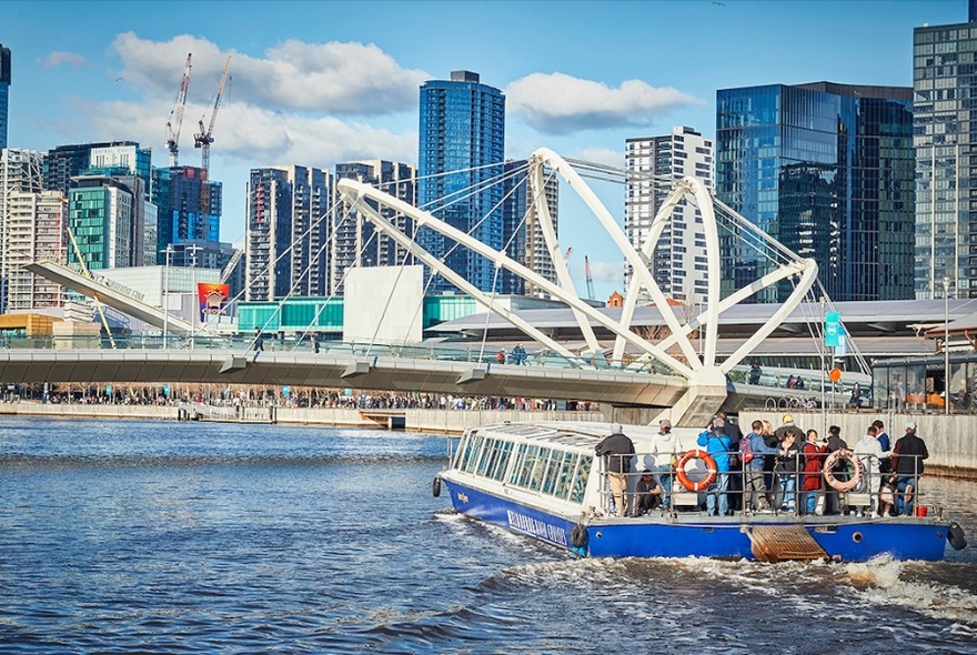 Cruise boat nearing Docklands and Victoria Harbour.
