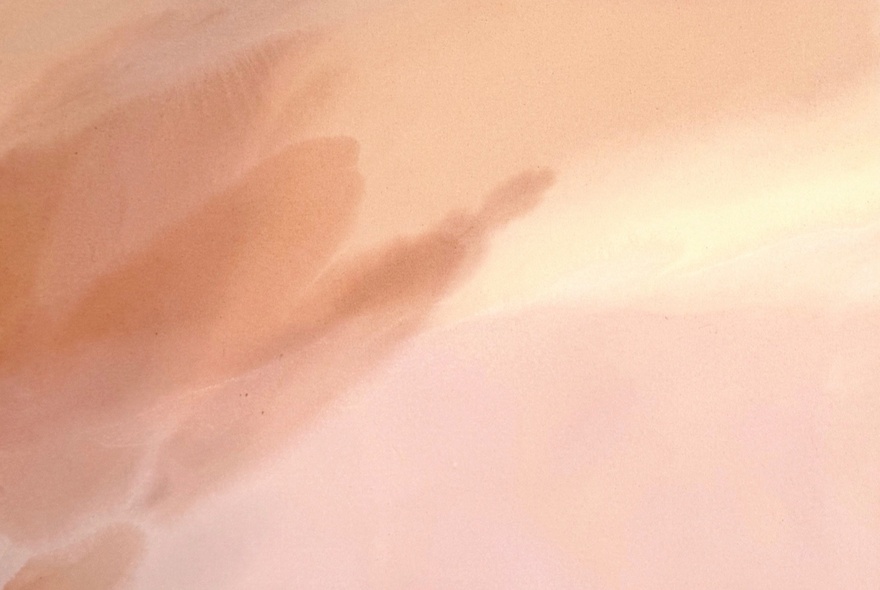 Abstract non-figurative painting in pastel pale orange tones. 