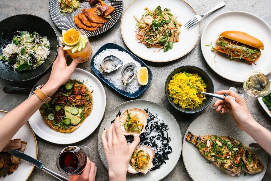 Plates of food, viewed from above.