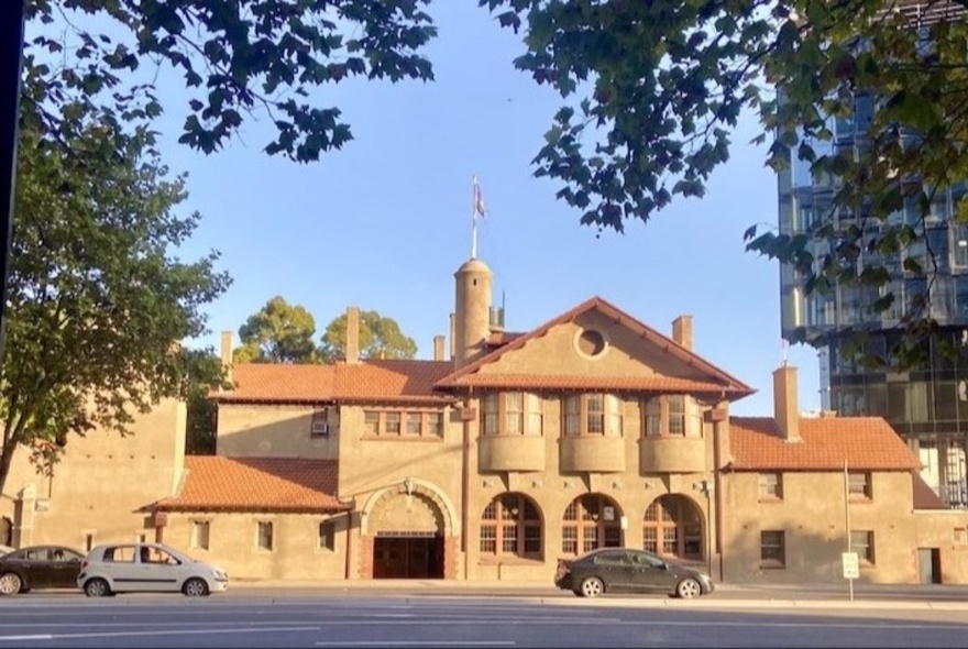 Exterior of the Mission to Seafarers building showing its Arts and Crafts and Spanish Mission Revival architectural style.