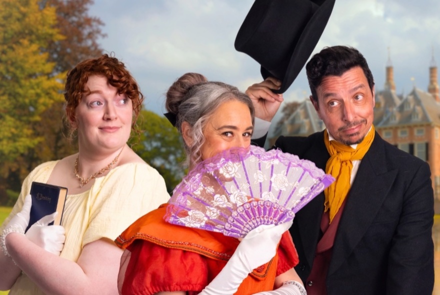 Three performers dressed in Regency outfits with fan, book and top hat.