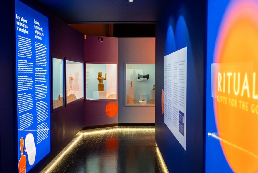 Installation view of an exhibition at Hellenic Museum in Melbourne, showing artworks on the walls.