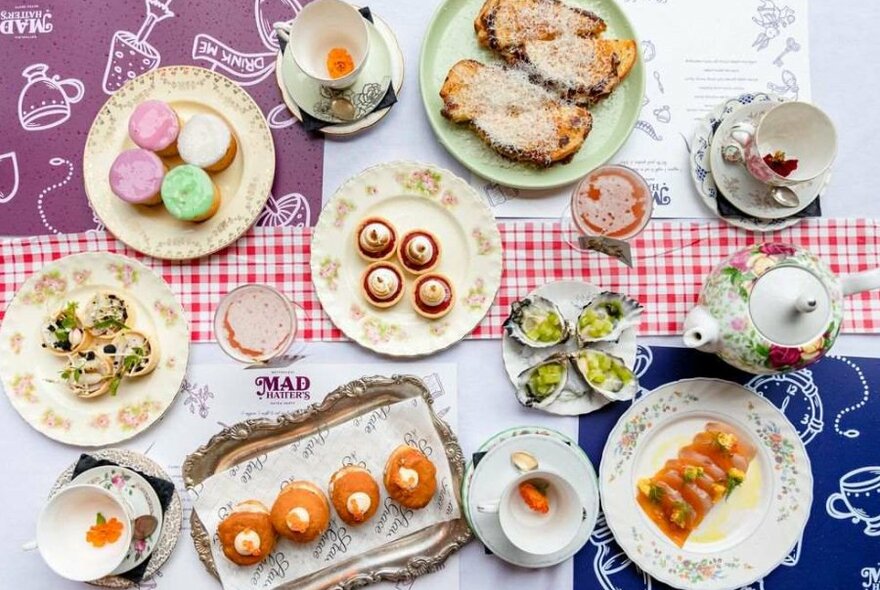 Plates of cakes and sweets on a table