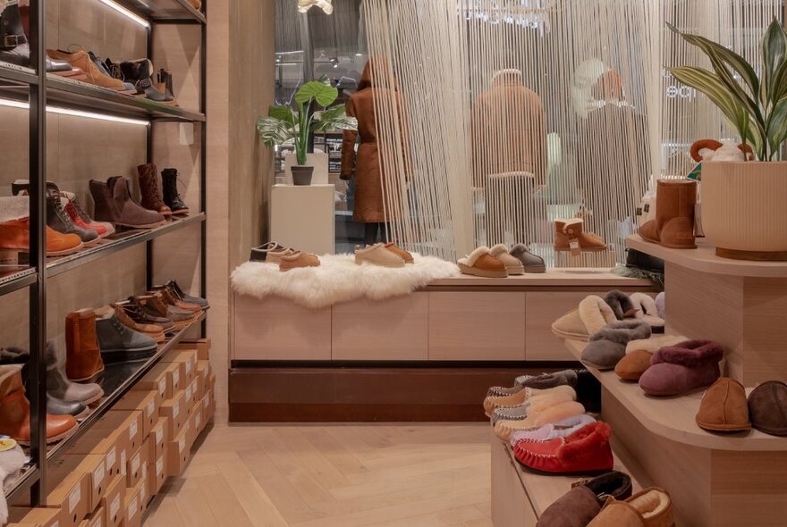 The interior of Yellow Earth at the Melbourne Emporium, with shelves of sheepskin slippers.