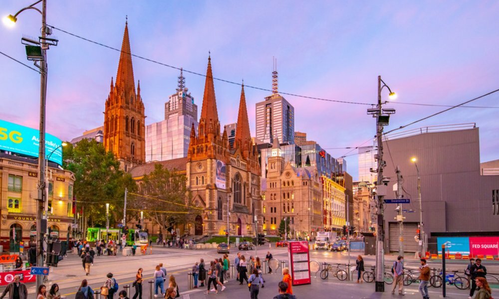 Sunset over Young and Jackson pub and historic buildings in Melbourne.