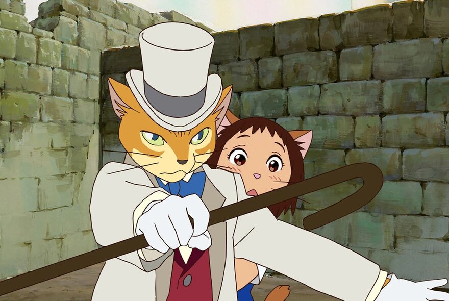 A still from a Japanese Anime movie for kids showing a young girl with cat ears hiding behind a tall cat in a top hat and tails, brandishing a cane.