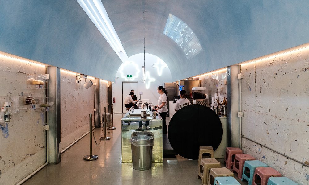 Inside a neon-lit ice cream shop