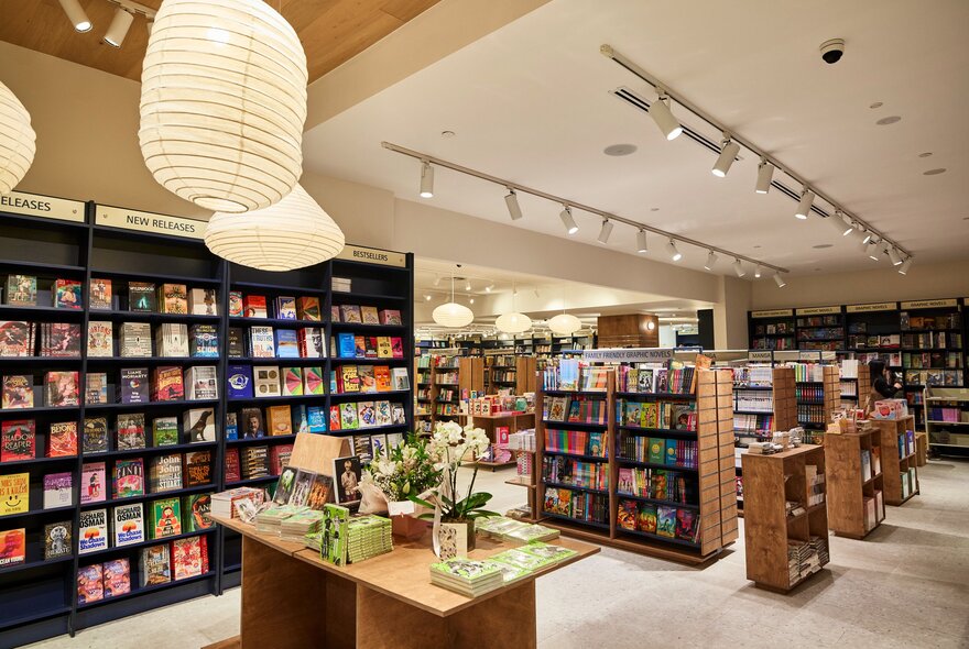 The inside of a carefully curated bookstore with shelves of books.