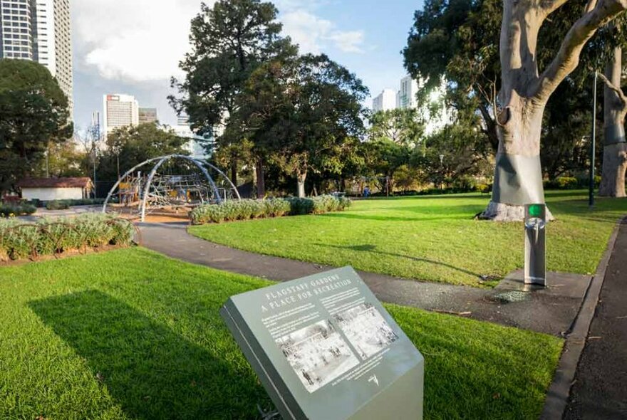 A public playground on a sunny evening  