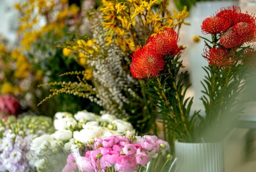 Bunches of flowers inside a florist shop.