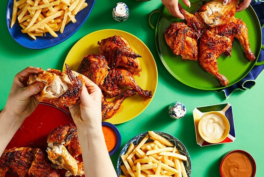 Dishes of Oporto foods against a green background.