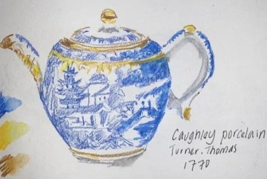 A hand-drawn sketch of a teapot with a blue and white design and gold touches, with a handwritten note alongside it.