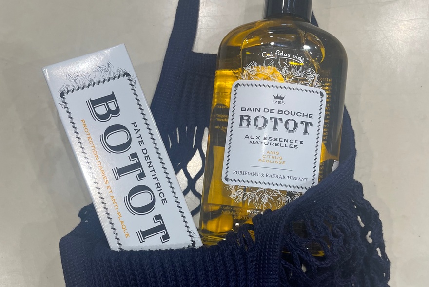 French toiletries in a string bag. 