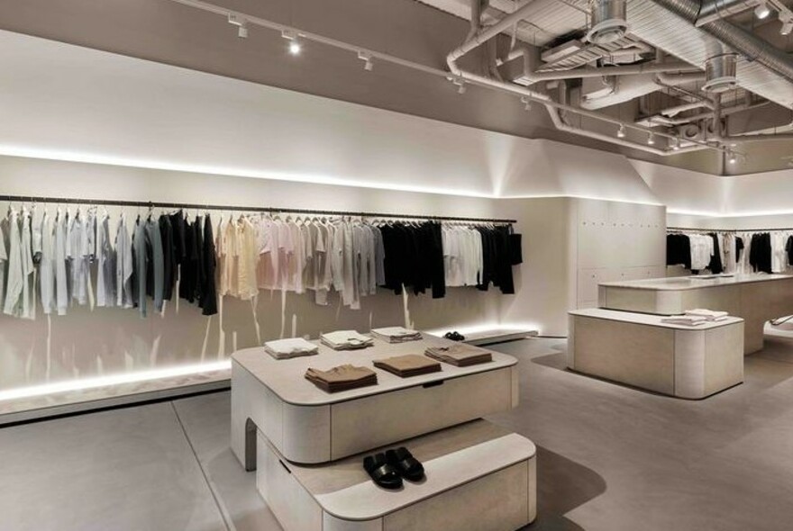 Minimalist white interior of Jac + Jack store.