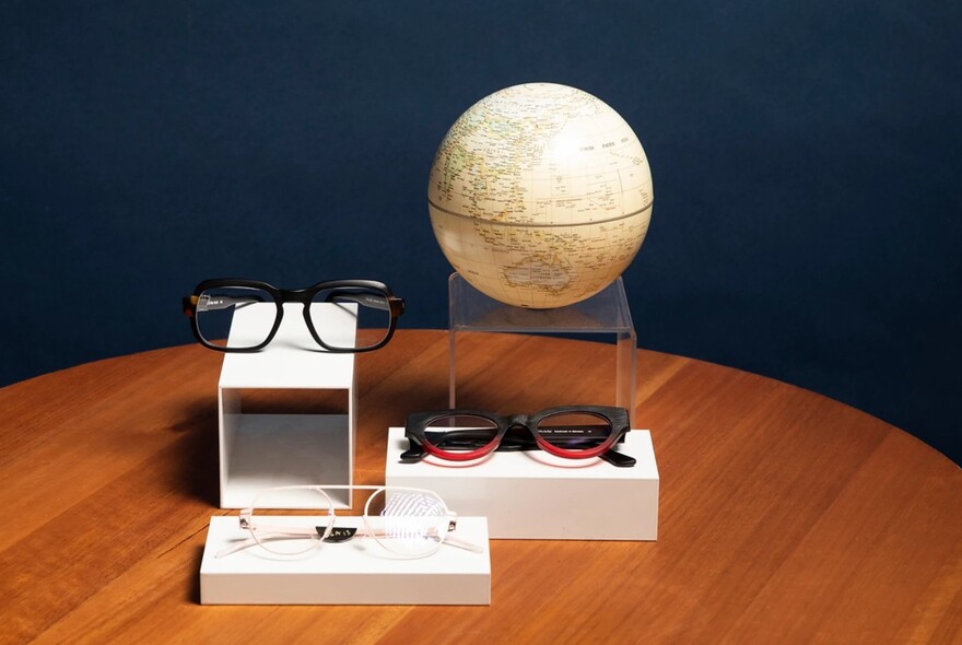 Eyewear and a globe.