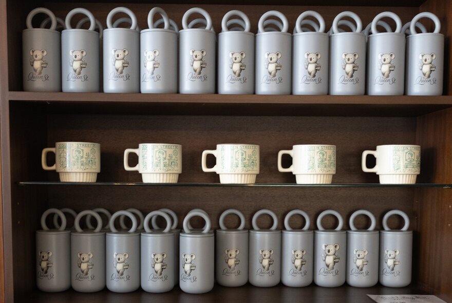 Rows of white cups and blue drink bottles.