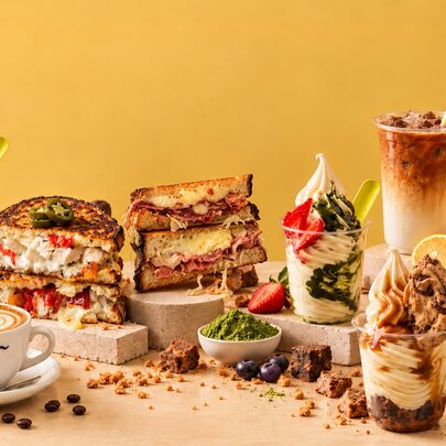 A selection of cafe treats including toasties, coffee, matcha drinks and soft serve with toppings. 