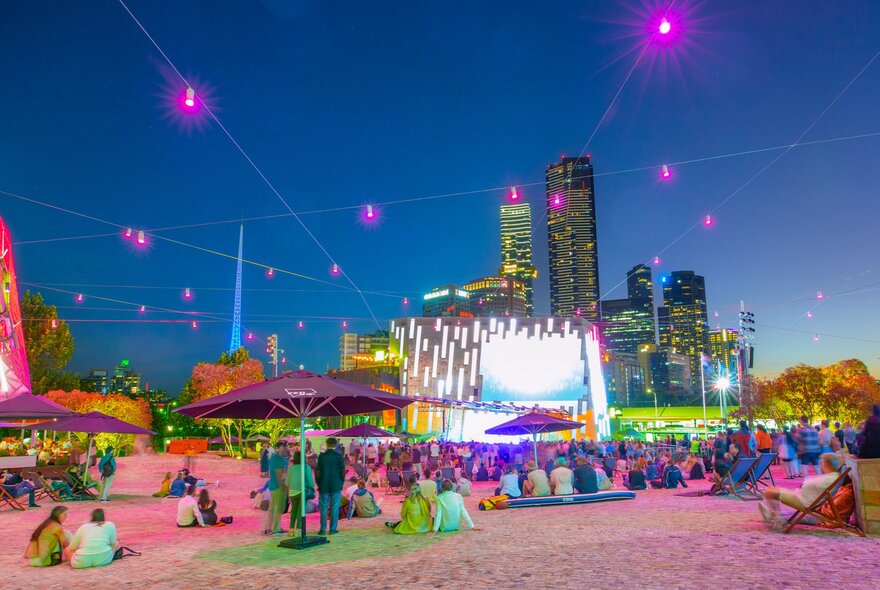 A concert at fed square at night
