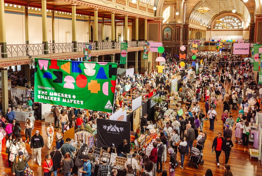 People crowded into the Royal Exhibition Building for a market. 