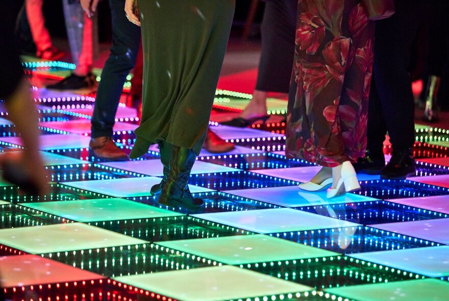 The glowing LED disco dance floor at the Melbourne Museum during the Discoteca Italiana late night event.