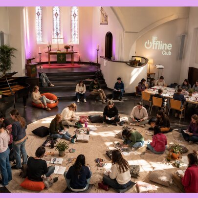 People enjoying a digital detox together inside a church space.
