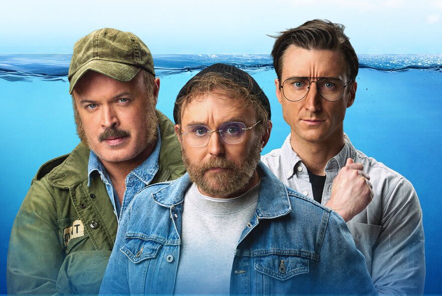 Actors dressed as three characters from the movie Jaws: Robert Shaw, Richard Dreyfuss and Roy Scheider.