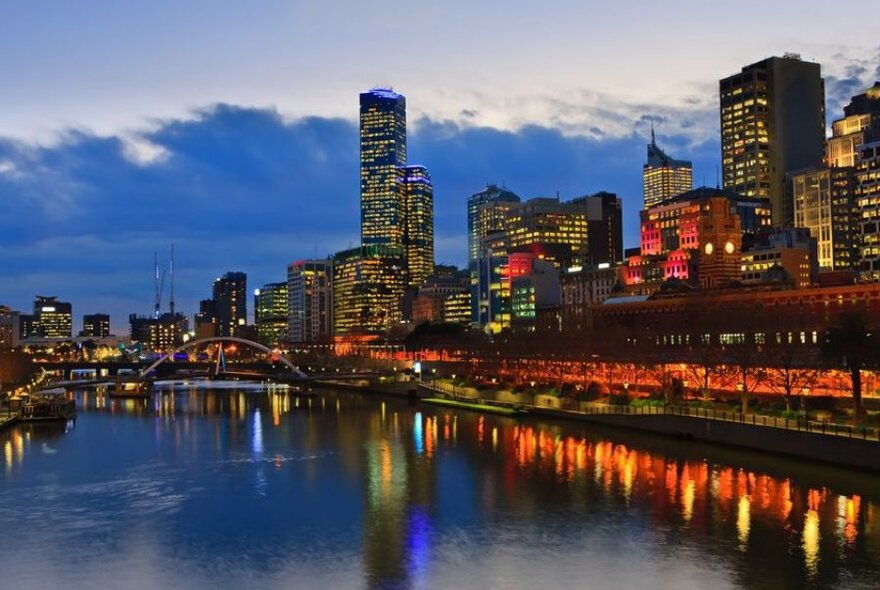 View of the Melbourne skyline and the Yarra River at dusk.