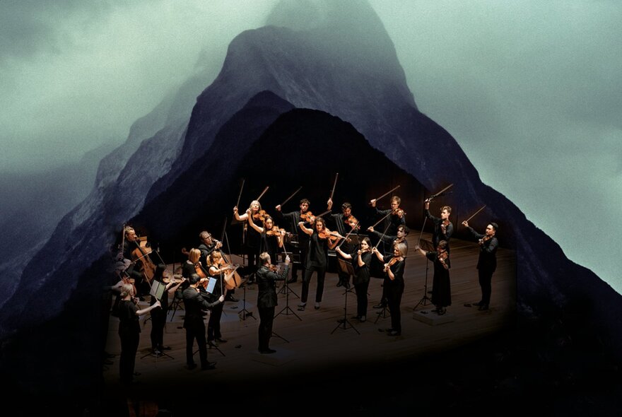 Image of a chamber orchestra inside / over the top of a dark moody mountain silhouette.