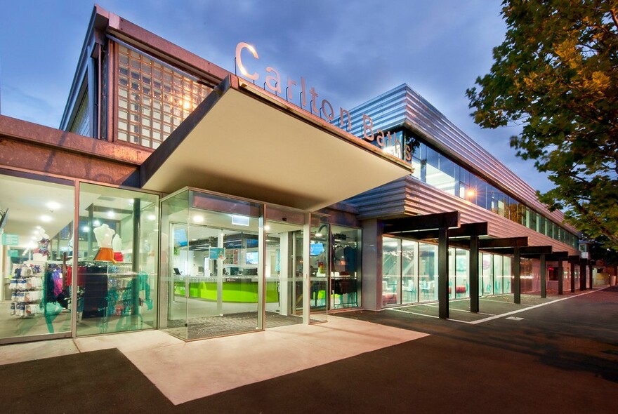 Entrance to the glass-fronted Carlton Baths building.