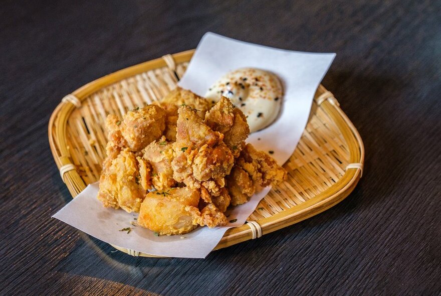 A basket of fried chicken.