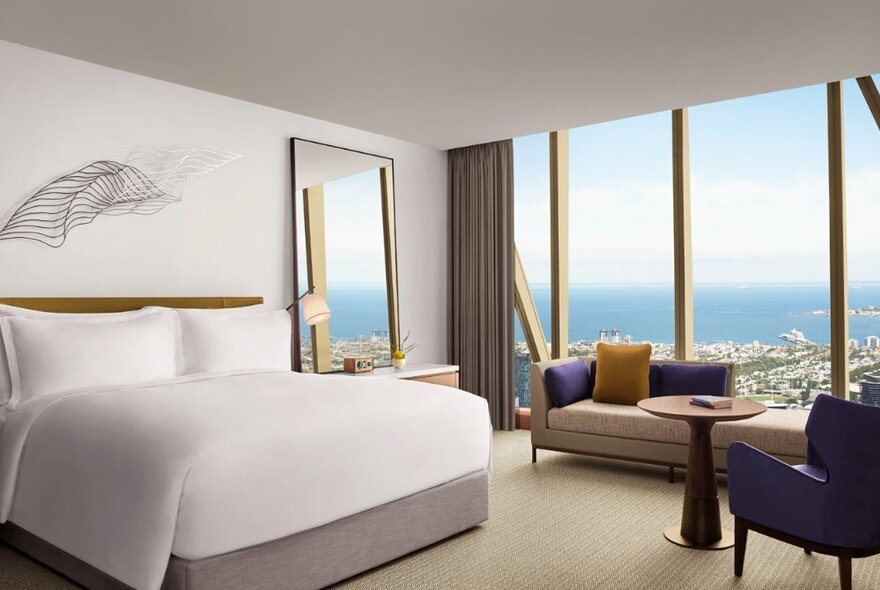 Hotel bedroom in the Ritz-Carlton, Melbourne with the bay and city below. 