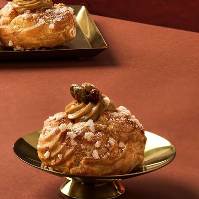 A choux pastry dessert filled with custard.