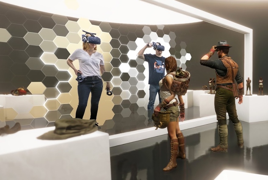 Participants in a VR game room wearing headsets.