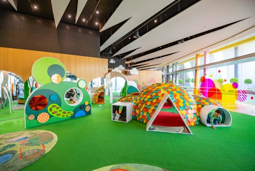 A brightly coloured indoor playground.