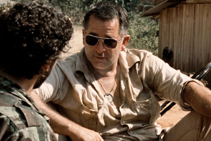 Two actors playing journalists, in a still from the film Balibo.